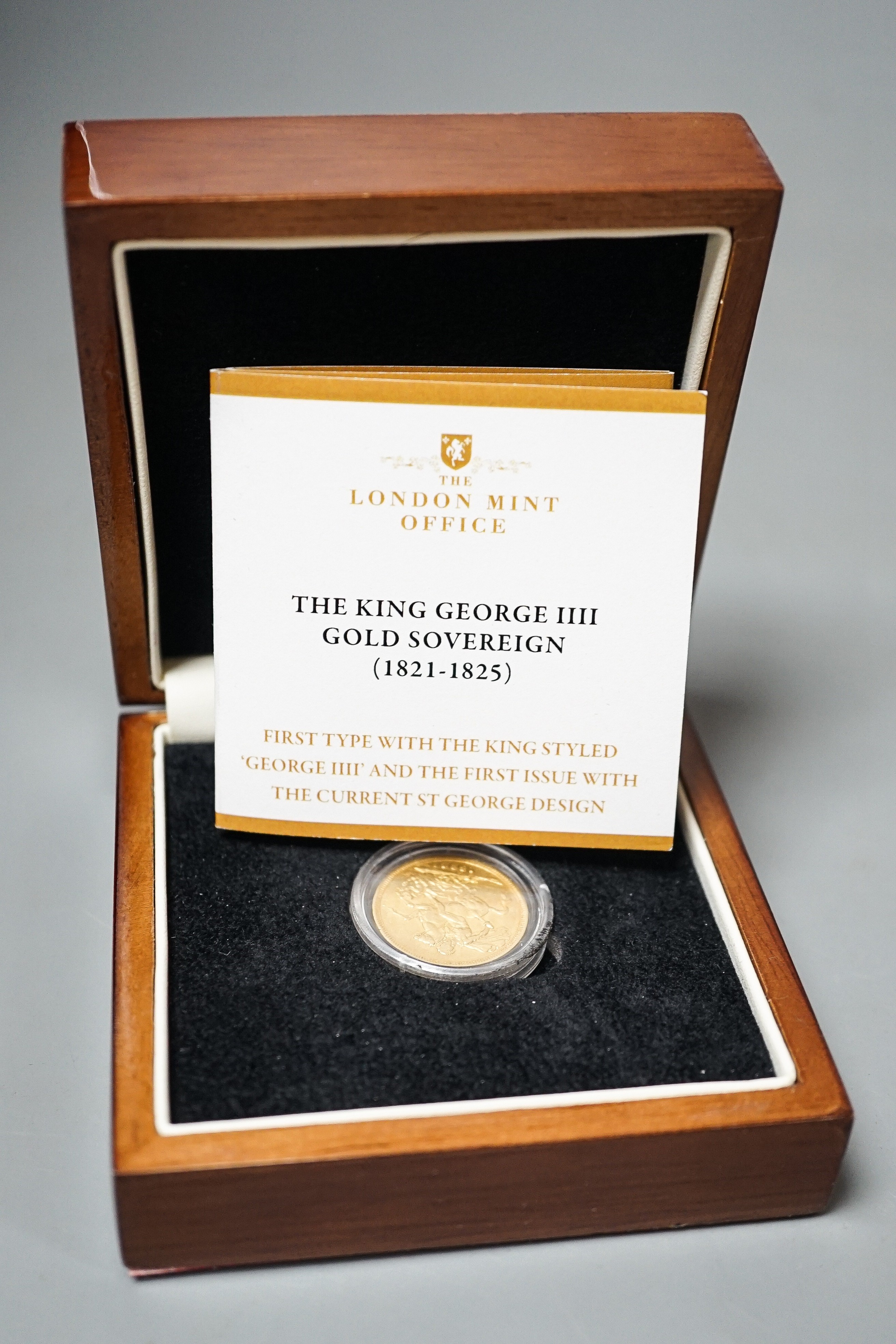 A George IV gold sovereign 1822, Good F, London mint presentation case.